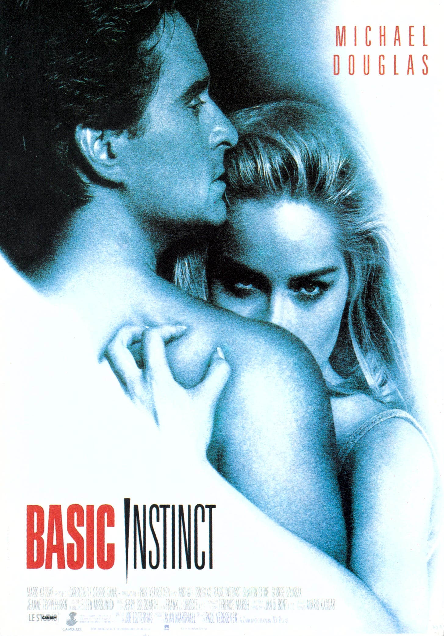 The poster for Basic Instinct, showing an embrace between Douglas and Stone, but Stone is looking over Douglas's shoulder at the viewer and her finger nails are digging into his shoulder.