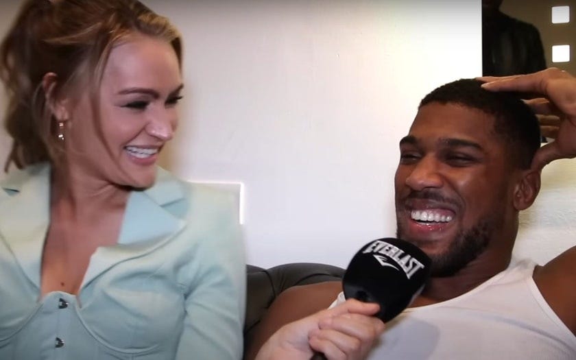 Fans react to Anthony Joshua flirting with boxing presenter Laura Woods  during interview