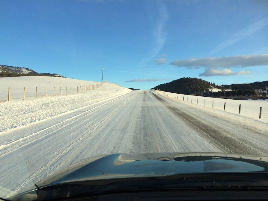Photo by Author — New Year’s Day 2014 — driving in Montana, and like the road, I have no idea where 2024 will go I can see it vanishing into the distance and it might be a bit treacherous