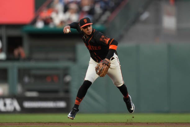 Thairo Estrada of the San Francisco Giants throws a ball in the infield against the Los Angeles Dodgers at Oracle Park on September 30, 2023 in San...