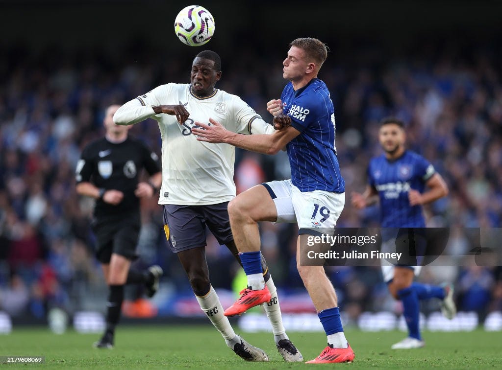 Abdoulaye Doucoure of Everton wins a header under pressure from Liam...  News Photo - Getty Images