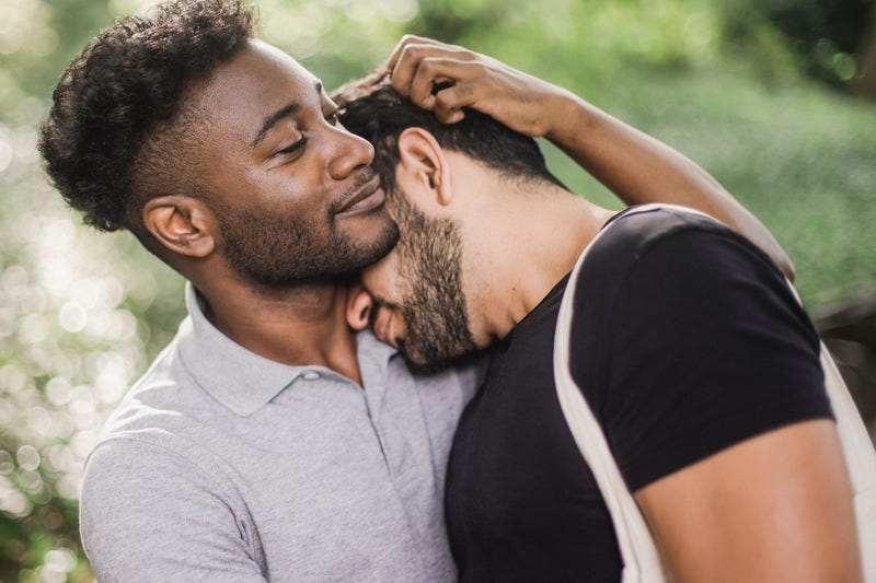 Portrait of couple cuddling with affection