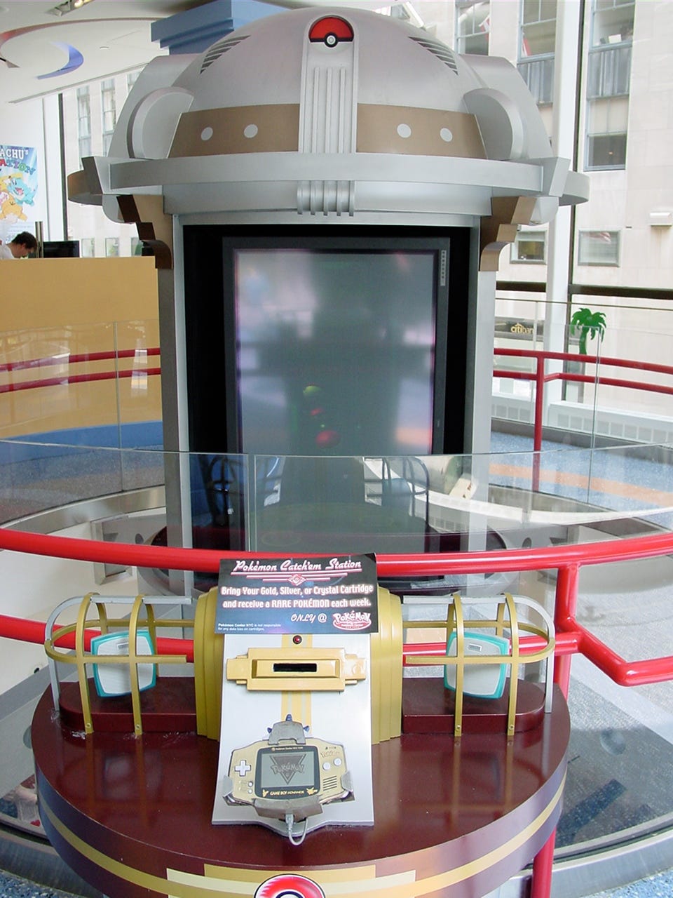 A photograph of The Pokémon Catch’em Station (a.k.a. The Pokémon Distribution Machine) located on the second floor, where customers could bring their copies of Pokémon Gold, Silver, or Crystal and receive a rare Pokémon