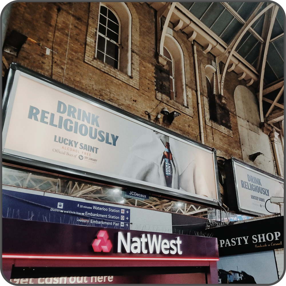 Large billboards with the slogan 'drink religiously', next to photos of a nun holding an alcohol-free beer bottle