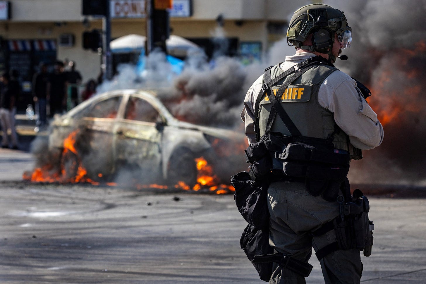 Smoke rises from a burning car on Atlantic Boulevard Smoke rises from a burning car on Atlantic Boulevard