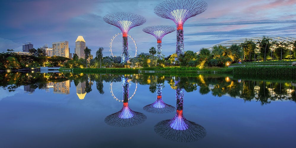 A place in SIngapore with three light decirated towers.