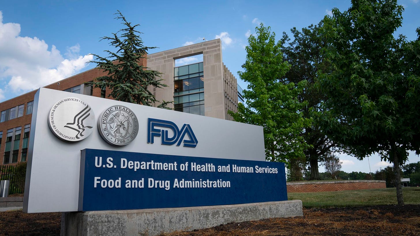 Picture of a sign displaying the Food and Drug Administration logo outside of the agency's headquarters