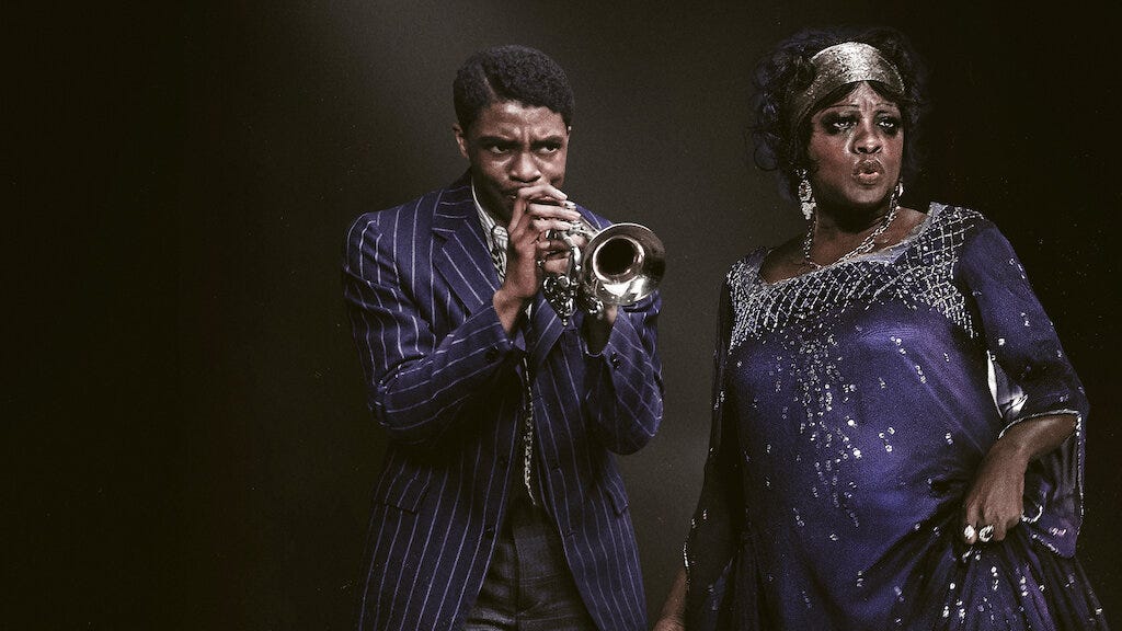 Chadwick Boseman as trumpet-playing Levee alongside Viola Davis as Ma Rainey