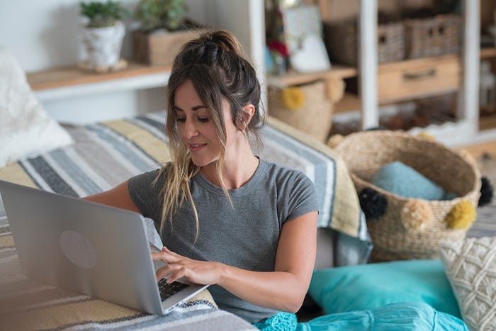 A woman typing on a laptop, perhaps working on her Medium stories. A woman typing on a laptop, perhaps working on her Medium stories.