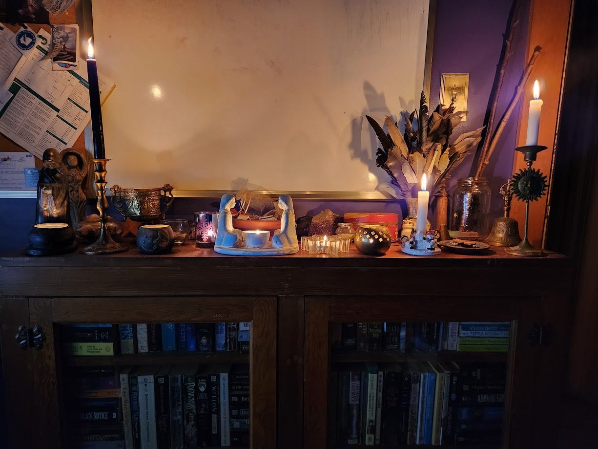 Solstice bookshelf altar.