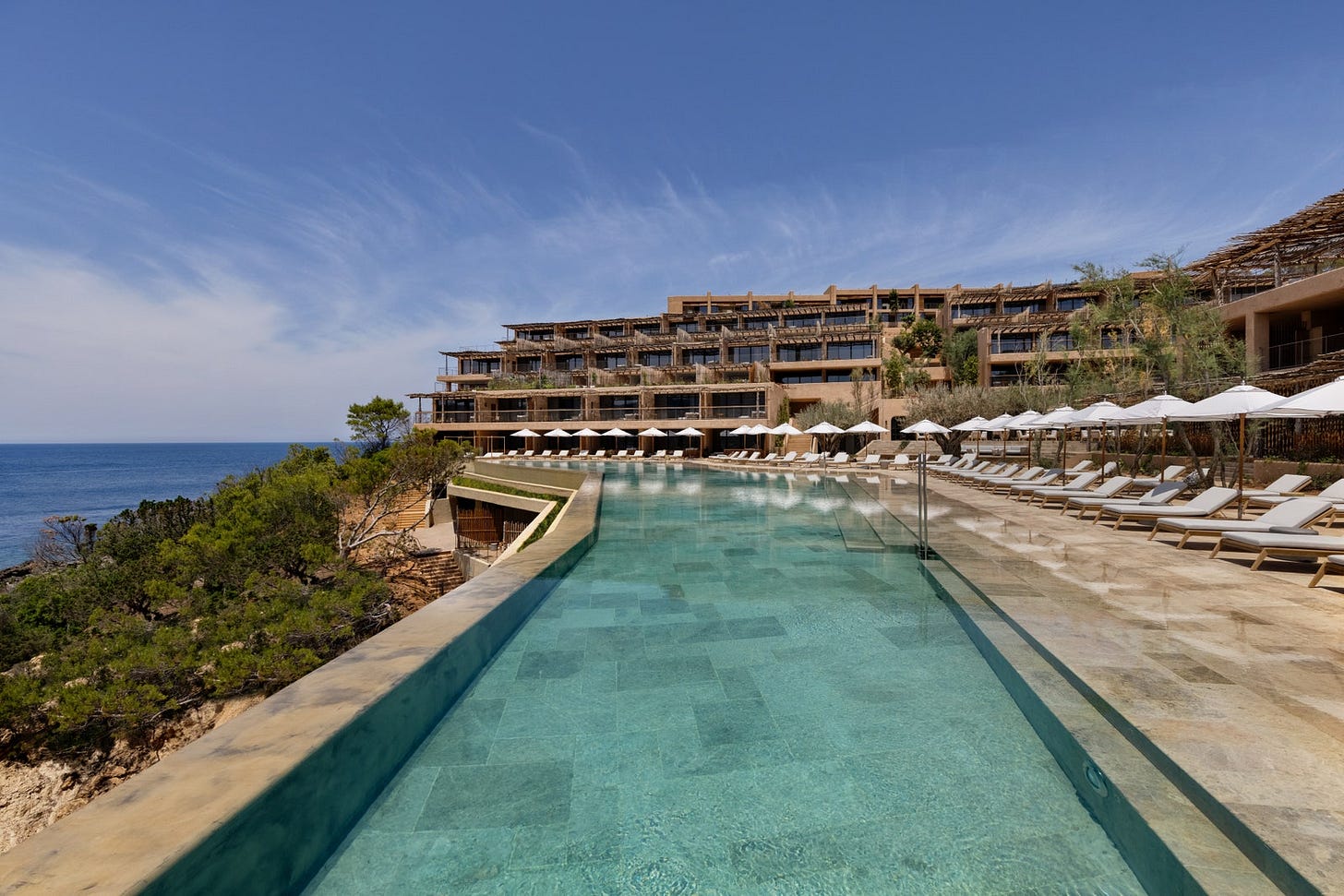 Image may contain Building Hotel Resort Pool Water and Swimming Pool