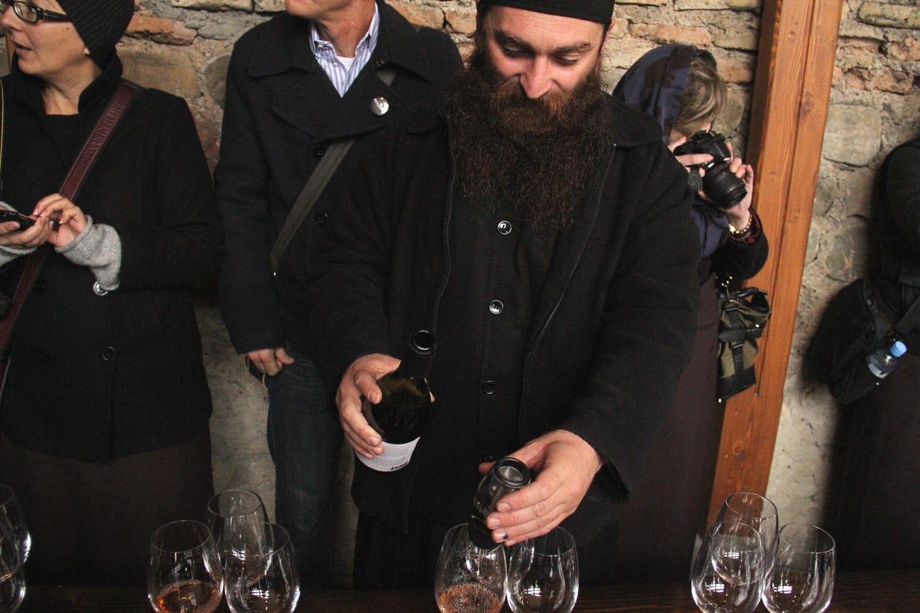 Father Gerasim pours the 2010 vintage (Nov 2012)