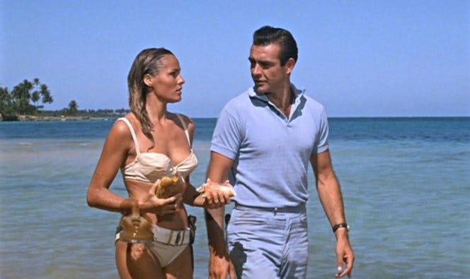 Note the Walther PP sticking out of his right rear pocket, although Bond seems pretty disarmed by Honey's equally dangerous assets.