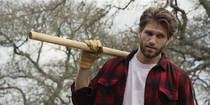 Walker gay brother Liam looking butch in lumberjack shirt and ax.