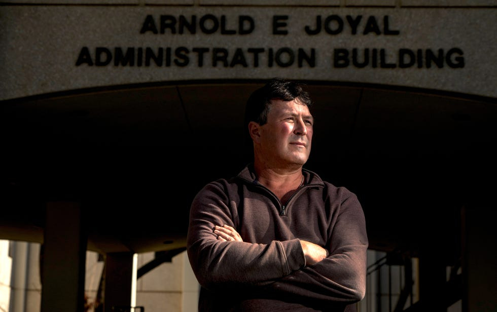 Terry Wilson in front of the Joyal Administration Building on the campus of California State University, Fresno, where he used to work.