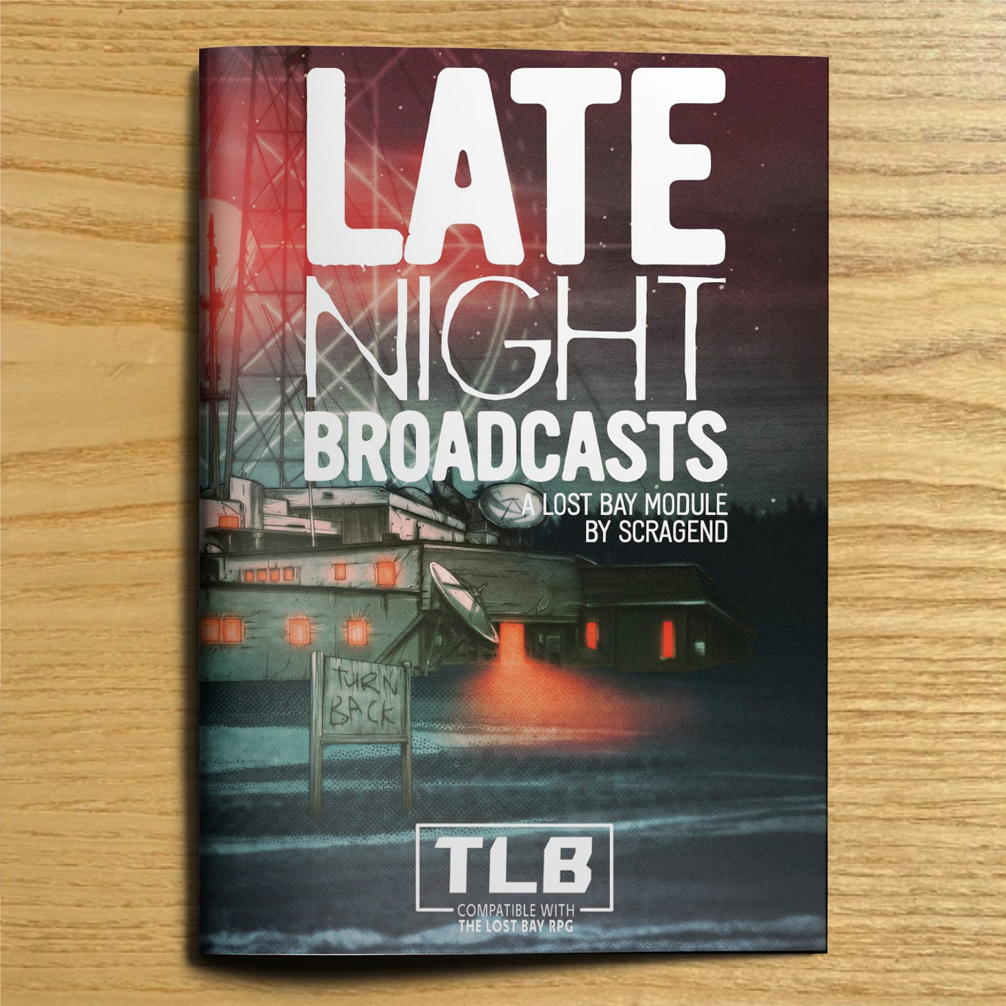 The cover for Late Night Broadcasts, featuring a sprawling building with a transmission tower, a sign in front reads “turn back.”