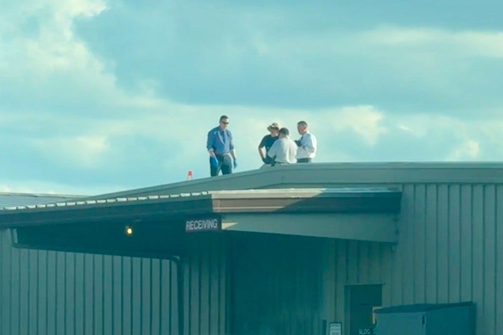 Inspectors search the roof the were Thomas Matthew Crooks fired his shots. 