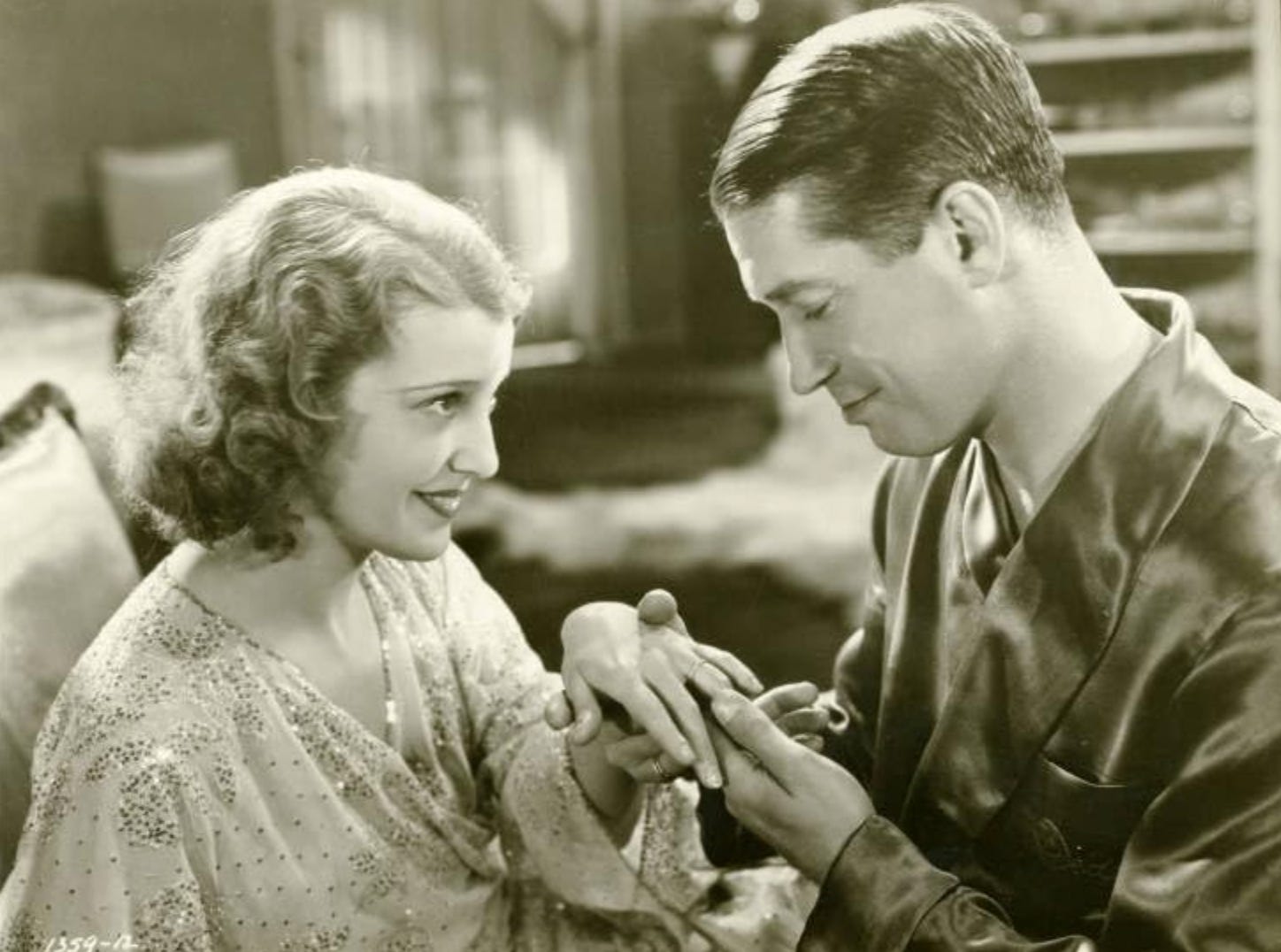 Jeanette MacDonald and Maurice Chevalier in a scene from One Hour With You