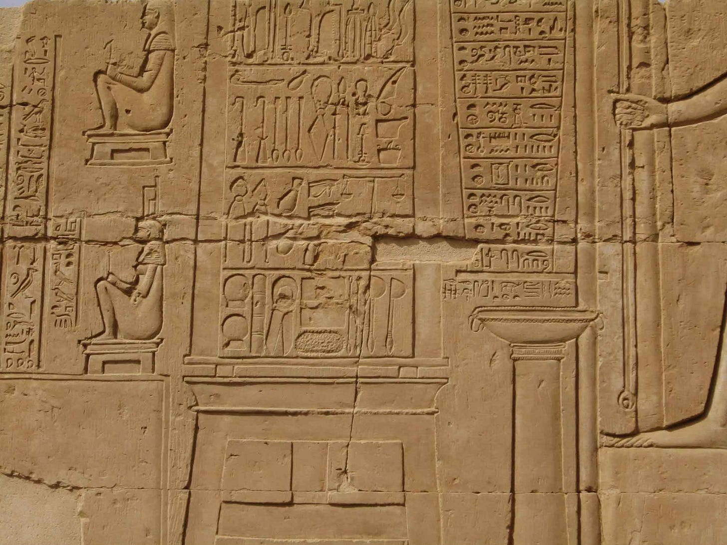 Panel of hieroglyphics and images on the back wall of Temple of Kom Ombo, showing surgical instruments Panel of hieroglyphics and images on the back wall of Temple of Kom Ombo, showing surgical instruments