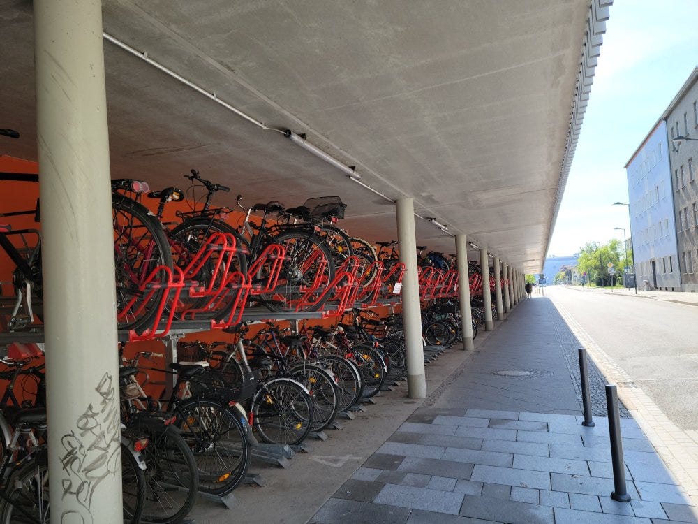 A double-stack row of bike racks outside the Oranienburg transit station in Oranienburg, Germany.