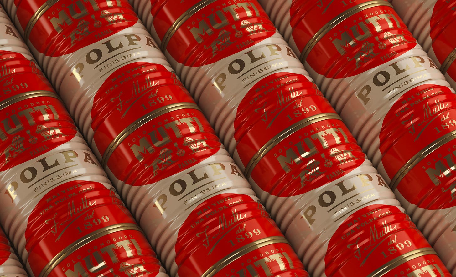 Limited edition Mutti tomato tins, with golden shimmering metallic highlights.