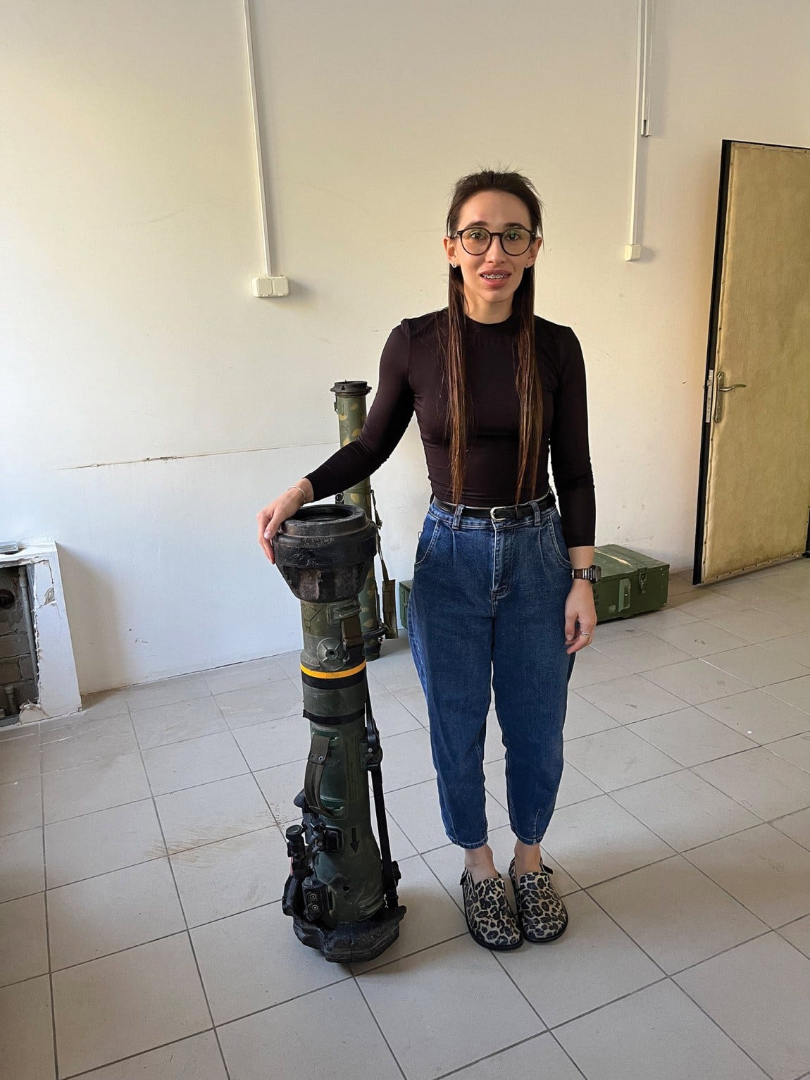 Tetiana Podchernina with an old British NLAW antitank missile used by Ukrainian forces