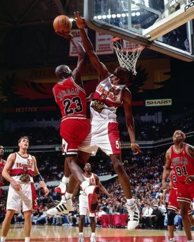 Dikembe Mutombo Blocks Michael Jordan Atlanta Hawks 8x10 NBA Basketball Photo - Picture 1 of 1