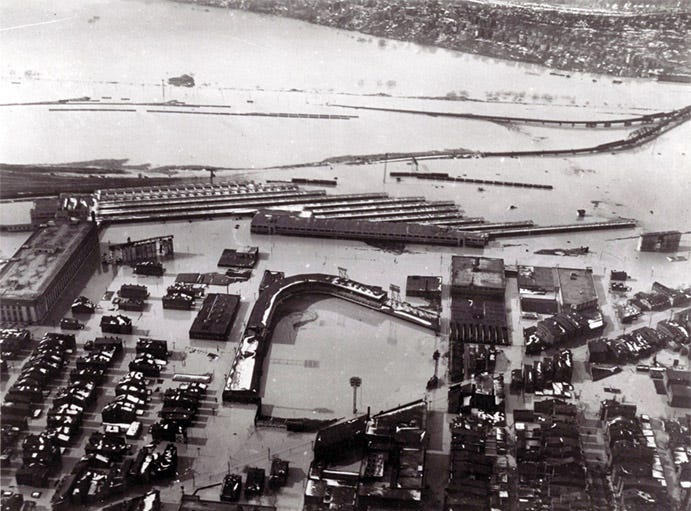 Flooded Crosley with the Mill Creek behind it.