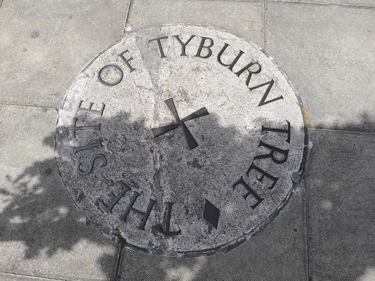 Plaque noting the site of the Tyburn Tree