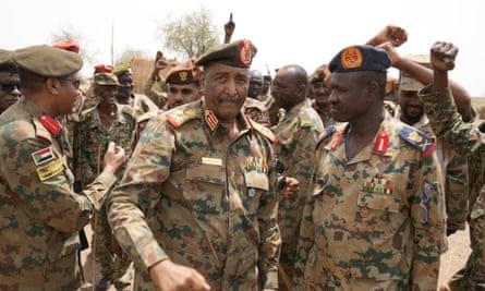 Gen Abdul Fattah al-Burhan, centre, near the Sudan-Ethiopia border in June 2022.
