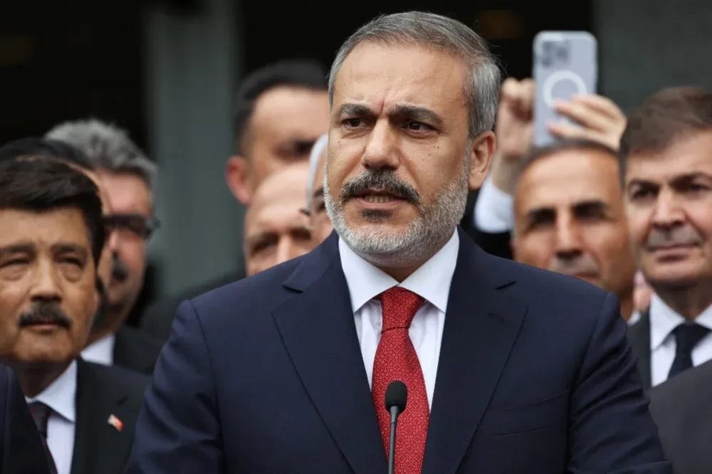 Turkish Foreign Affairs Minister Hakan Fidan delivers a speech during a handover ceremony in Ankara. (AFP)