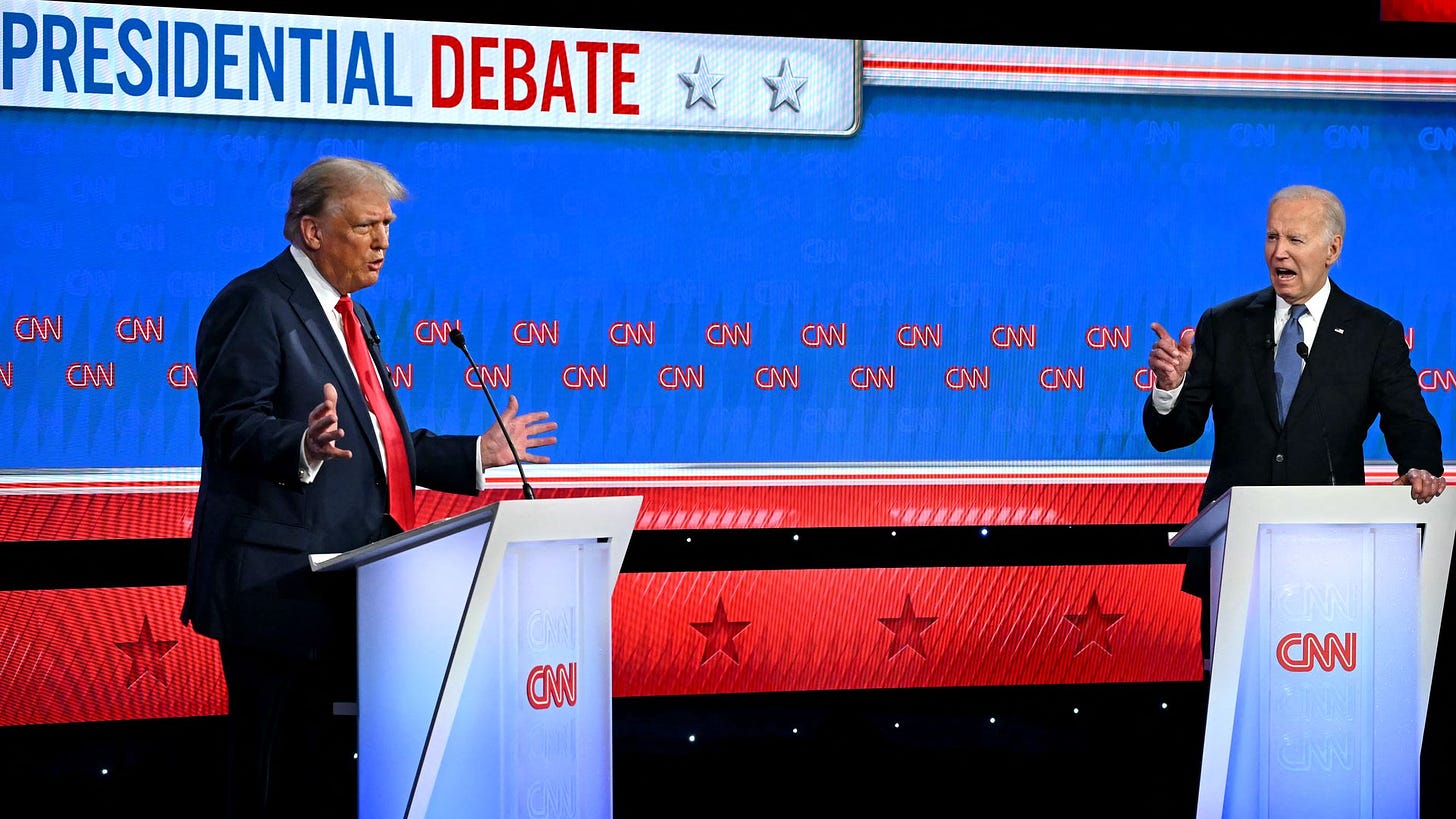  President Joe Biden and former US President and Republican presidential candidate Donald Trump participate in the first presidential debate of the 2024 elections at CNN's studios in Atlanta, Georgia, on June 27, 2024. 