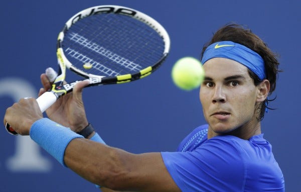 rafael nadal hitting balls hard for 2015 tennis atp images