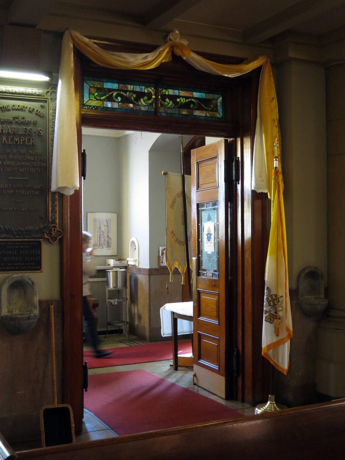 Interior door between nave and narthex, draped for the Year of Mercy