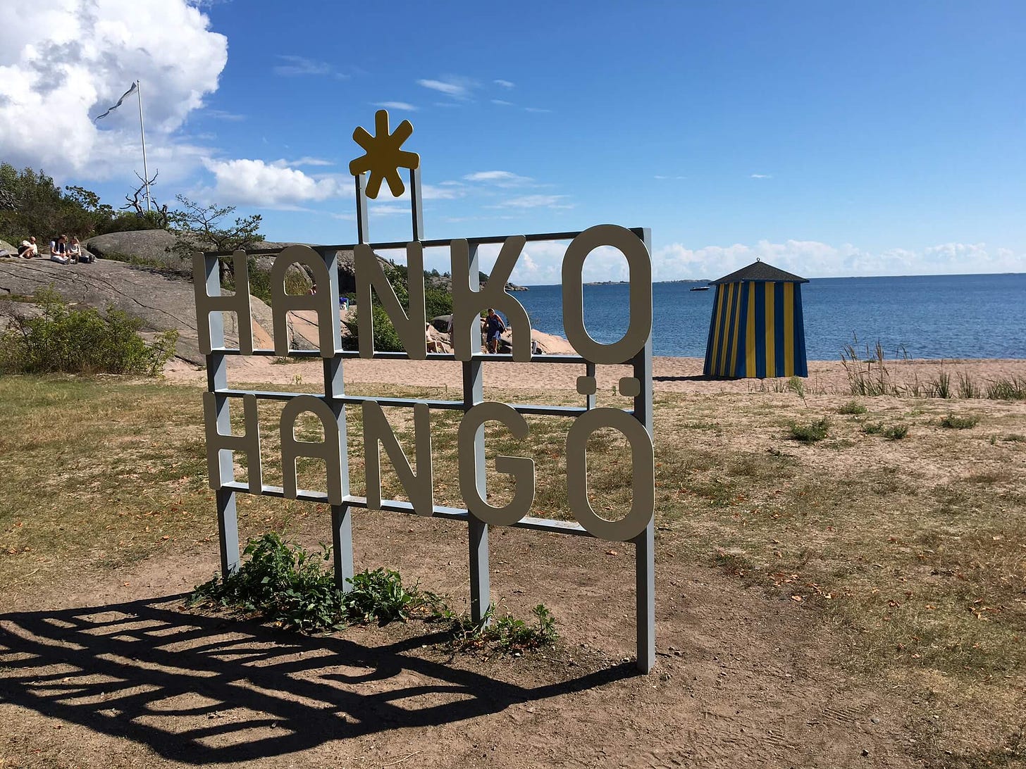 A beach, a hut and the text Hangö Hanko