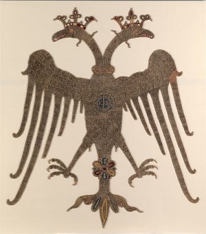 A Byzantine embroidered double headed eagle dating from the late 14th century. It was probably either from an altar cloth or a podea, the panel that is hung below an Orthodox icon. 