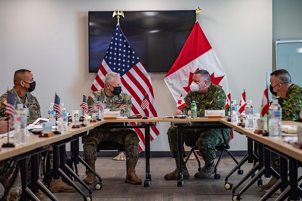 Major-General Conrad Mialkowski, Deputy Commander of the Canadian Army, and Lieutenant General John R. Evans, Jr., Commander of the United States Army North (Fifth Army) and Senior Commander, Fort Sam Houston and Camp Bullis, conduct briefings during a visit to Canadian Army Headquarters in Ottawa on March 8, 2022. Photo: Sailor First Class Camden Scott, Directorate Army Public Affairs. Major-General Conrad Mialkowski, Deputy Commander of the Canadian Army, and Lieutenant General John R. Evans, Jr., Commander of the United States Army North (Fifth Army) and Senior Commander, Fort Sam Houston and Camp Bullis, conduct briefings during a visit to Canadian Army Headquarters in Ottawa on March 8, 2022. Photo: Sailor First Class Camden Scott, Directorate Army Public Affairs.