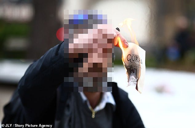 A man has been arrested after a video appeared to show him burning a Quran page by page in Manchester