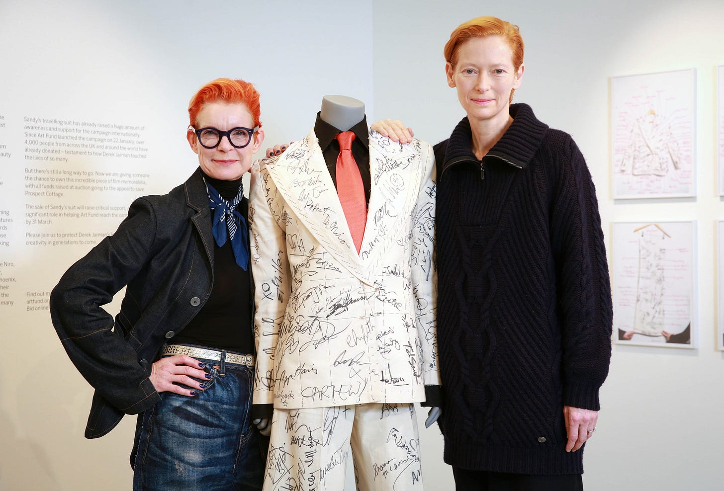 Tilda Swinton and Sandy Powell stand with her 'Signed suit for the Prospect Cottage campaign 2020' before it goes to auction at Phillips Auction House, London.