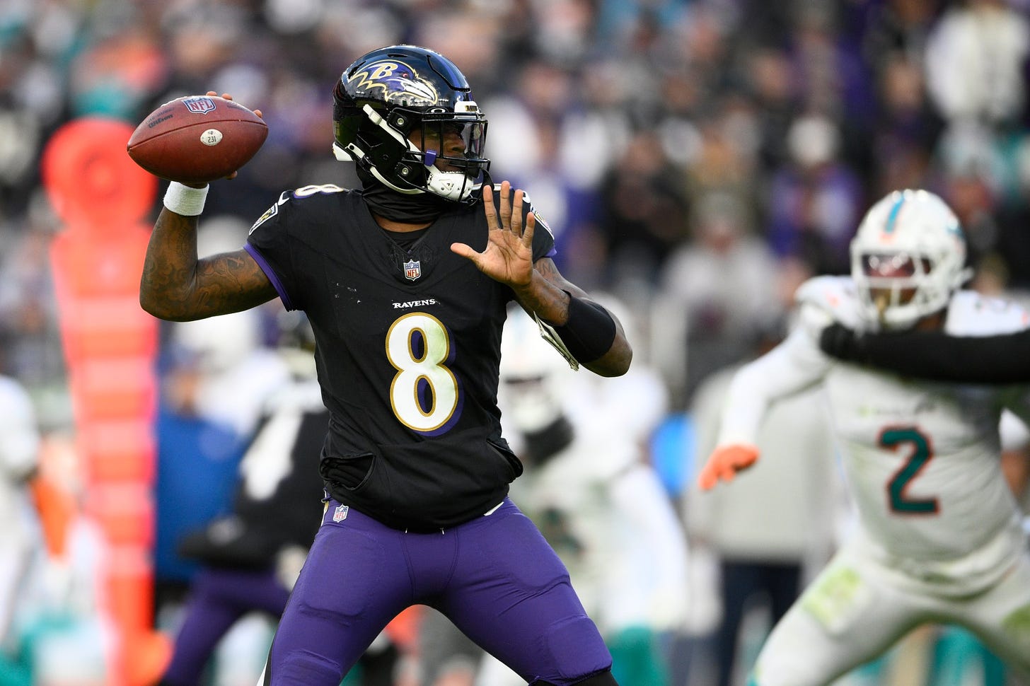 Lamar Jackson's perfect passer rating helps Ravens rout Dolphins 56-19 to  clinch top seed in AFC – CBS17.com