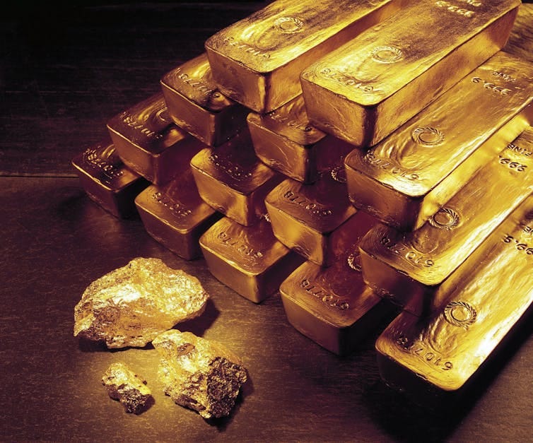 Gold nuggets and bars.