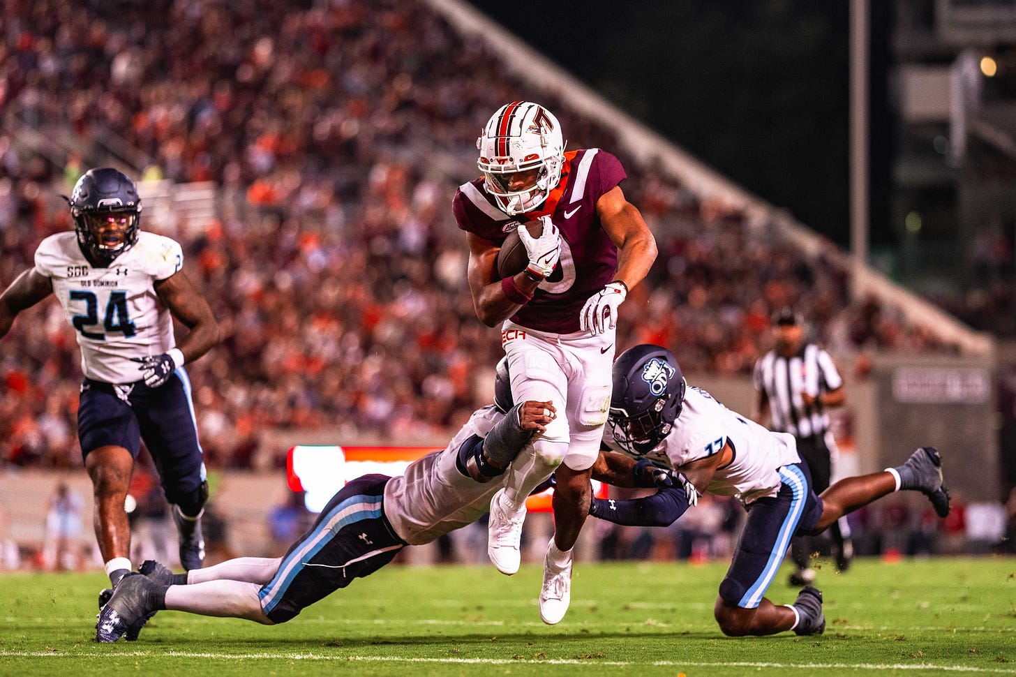 Virginia Tech wide receiver Ali Jennings breaks a tackle against Old Dominion.