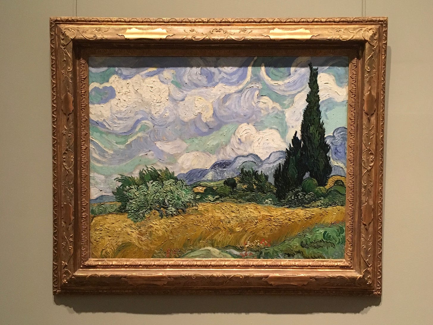 Vincent van Gogh's Wheatfield with Cypresses that hangs in The Metropolitan Museum of Art.