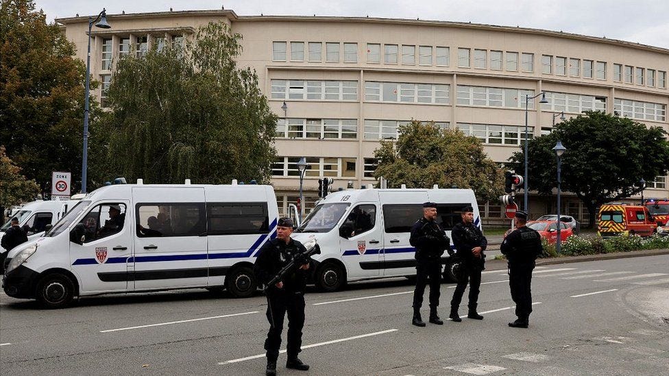 Police guarding the school in Arras after Friday's attack