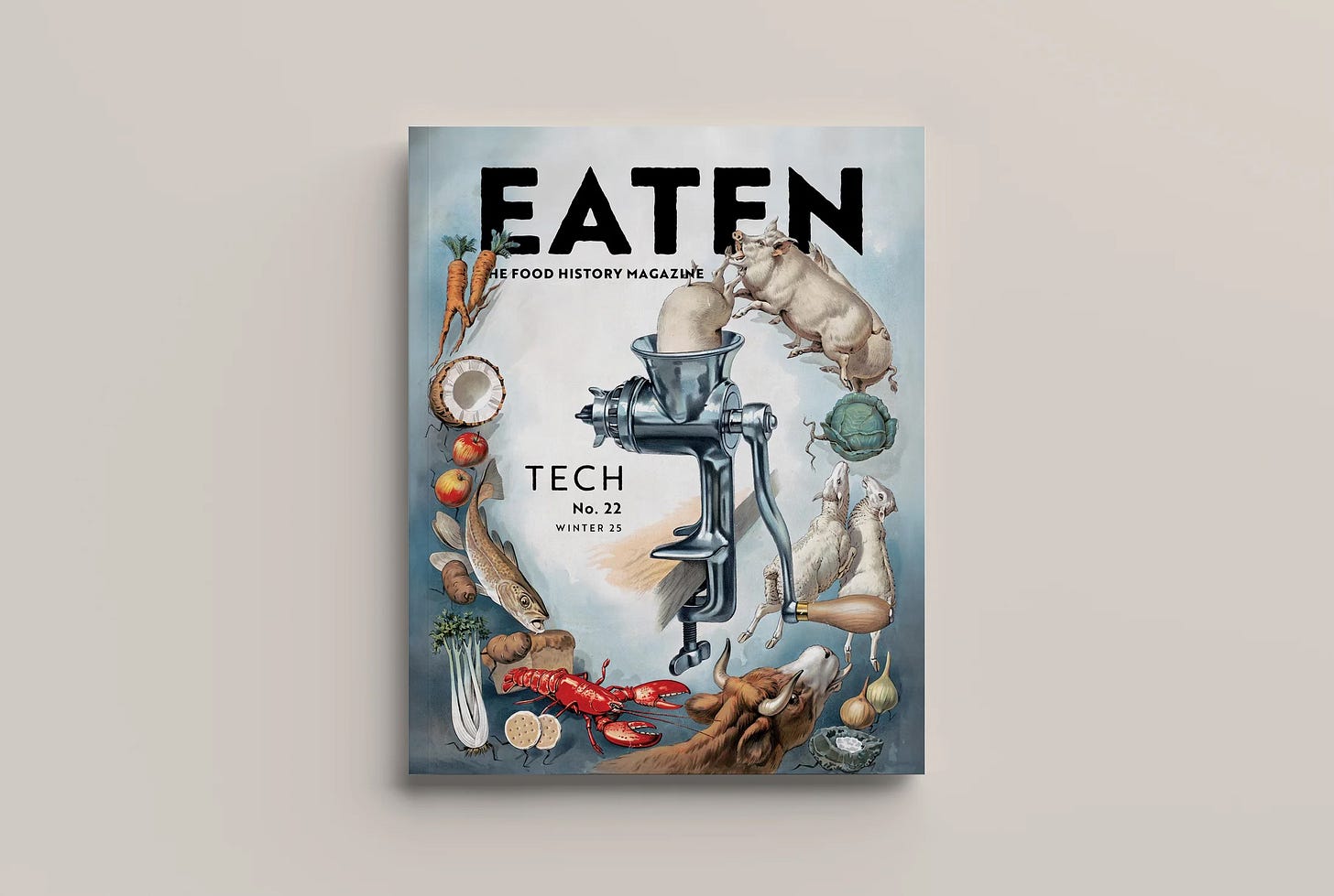 The cover of Eaten magazine, with an illustration of various foodstuffs being processed through a meat grinder.