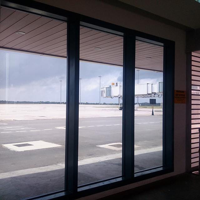 No planes here. The empty ramp and runway of Mattala Rajapaksa International Airport. Image: Wade Shepard 