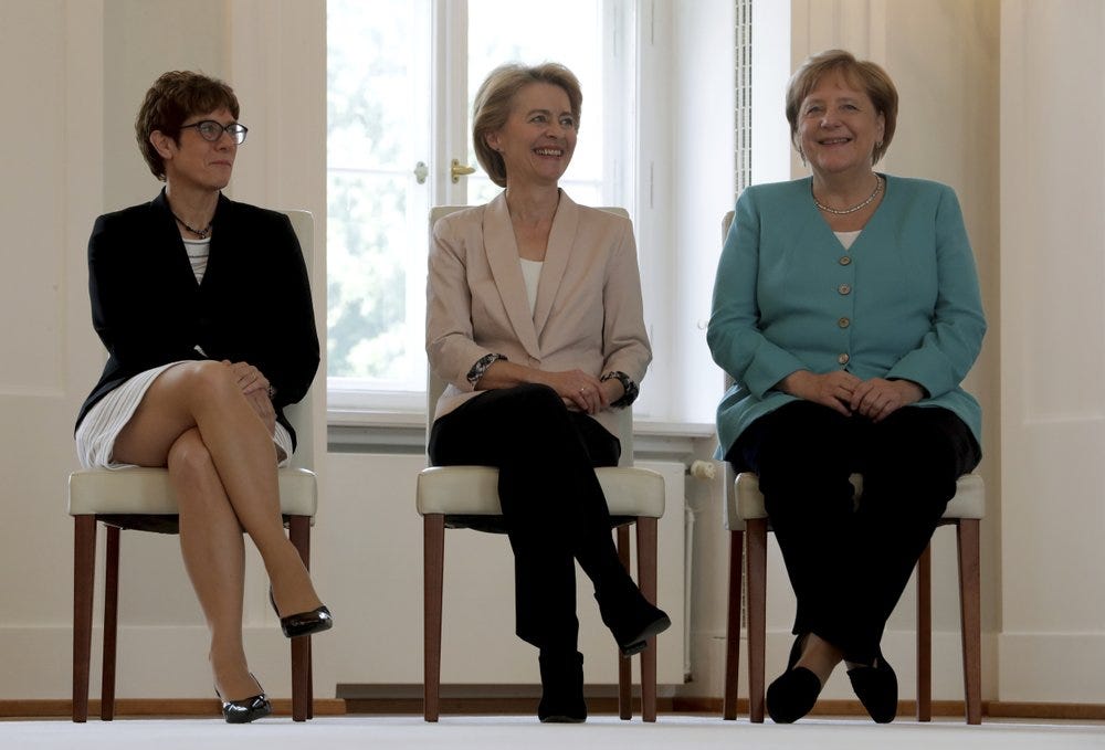 From right, German Chancellor Angela Merkel, new elected European Commission President Ursula von der Leyen and Annegret Kramp-Karrenbauer, von der Leyen's successor as German Defense Minister, attend an office over ceremony at the Bellevue Palace in Berlin, Germany, Wednesday, July 17, 2019. (AP Photo/Michael Sohn)