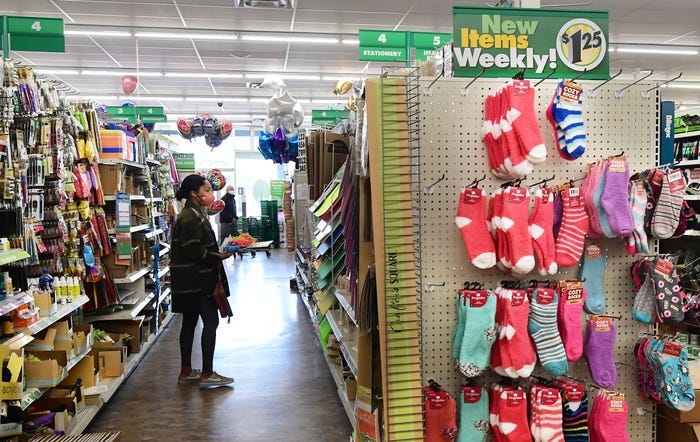 A woman shops at the Dollar Tree store where $1.25 price tags are now posted on the shelves, in Alhambra, California, December 10, 2021.