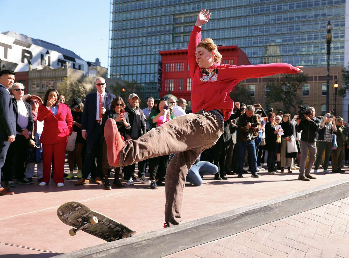 As San Francisco Mayor London Breed watches, skateboarder Rye Tewksbury tries to stay upright during U.N. Plaza reopening event at Civic Center in San Francisco on Wednesday, November 8, 2023.
