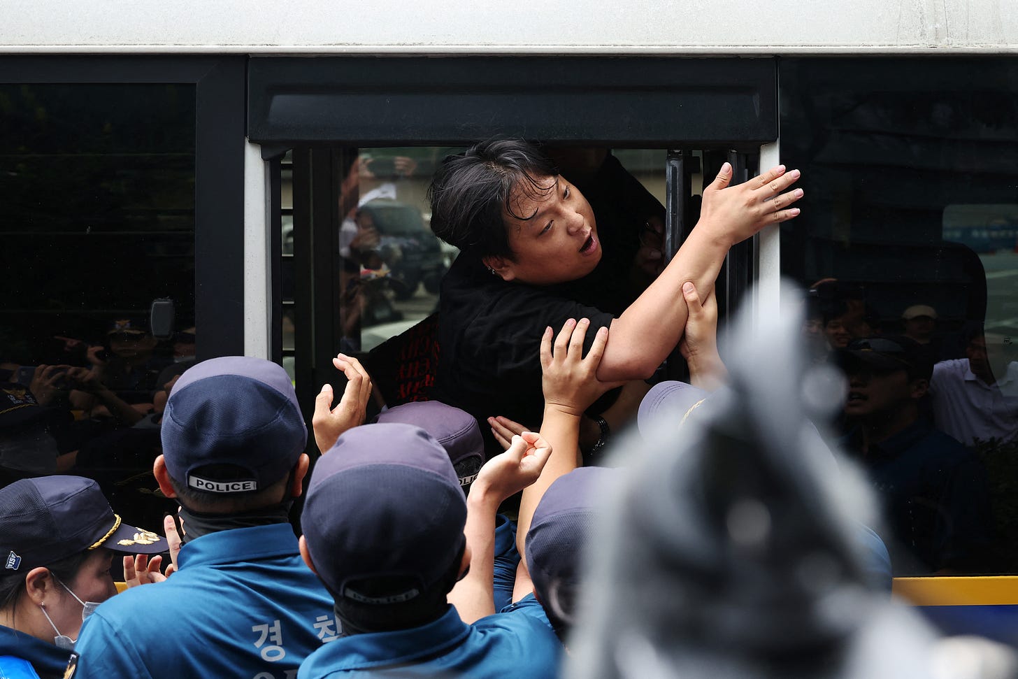 South Korea police arrest 16 Fukushima protesters targeting Japan embassy |  Reuters